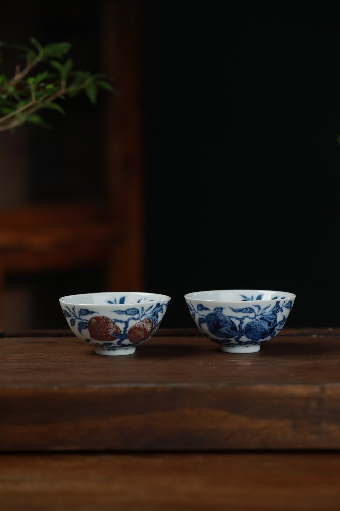 布一窑青花釉里红寿桃主人杯